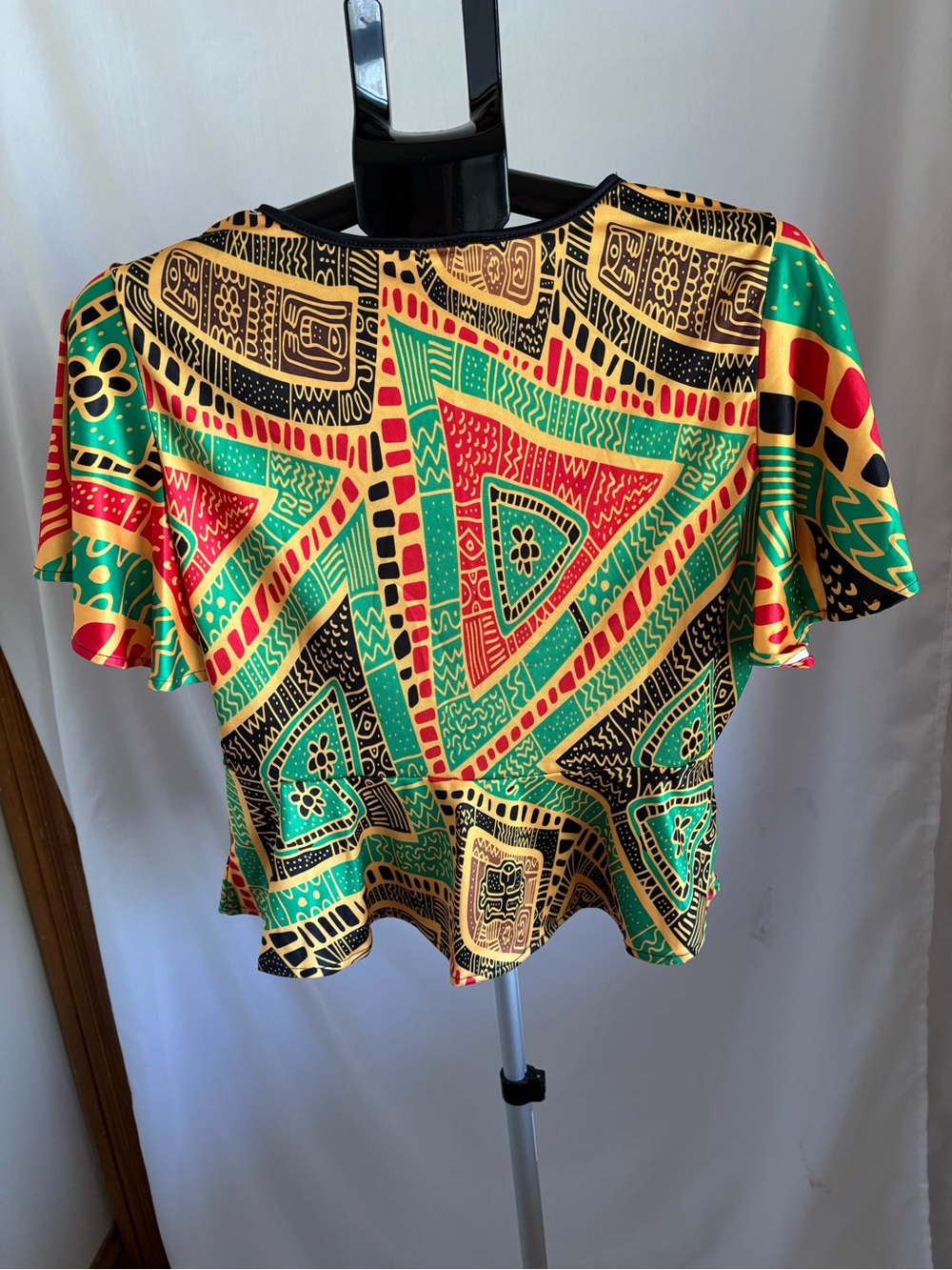 Vibrant Geometric Flutter Crop Top in Green, Red & Yellow - Picture 2 of 3